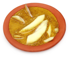 Green mango on kasundi - A Bengali relish