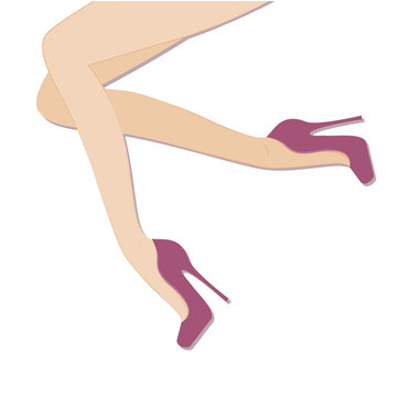 Slender female legs in shoes on high heels.