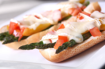 brie and asparagus appetizer on bread