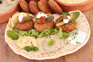 pita bread with falafel and sauce