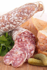 close up on salami and bread