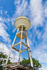 Water supply tank on blue sky