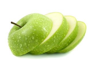 Isolated green apple slices with water drops