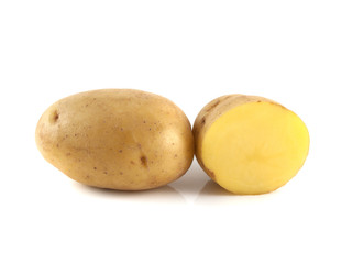 New potato with sliced half isolated on white