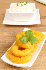 Fried calamari rings with mayonnaise