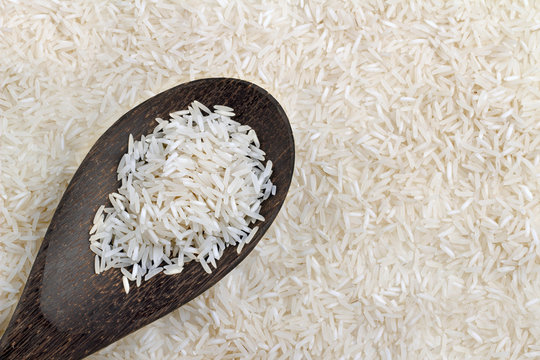 wooden spoon with basmati rice