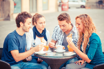 Group of Friends Having a Traditional Italian Breakfast
