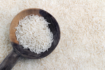 wooden spoon with thai rice