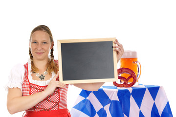 pretty woman in dirndl with blank sign and beer mug