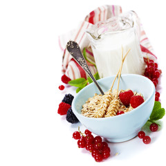 healthy breakfast with bowl of oat flakes