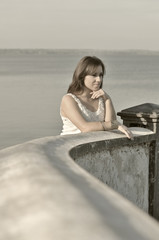 The teen on a pier