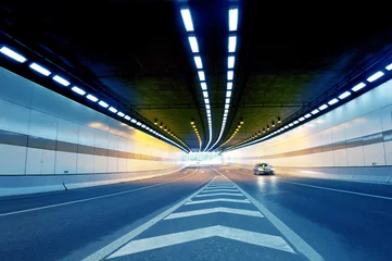 Tuinposter Tunnel Abstract speed motion in urban highway road tunnel
