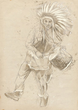 Indian Chief plays the drum and dance