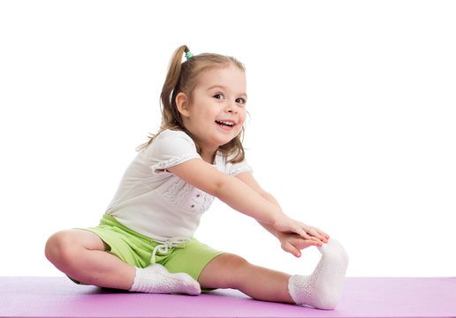 Kid girl doing fitness exercises