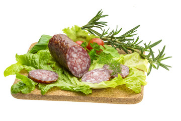 Salami with rosemary, salad and tomatoes