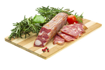 Salami with rosemary, basil and tomato