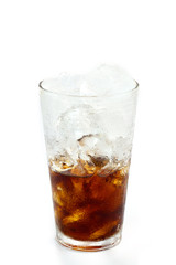 Cola glass with ice cubes over white
