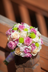 Beautiful wedding bouquet of fresh pink roses bridal flowers