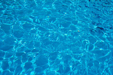 Fototapeta premium Hotel swimming pool with sunny reflections