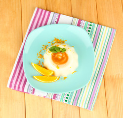 Panna Cotta with orange zest and caramel sauce,