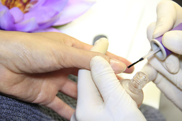 Obraz na płótnie Canvas Female Hand - in manicure treatment - before