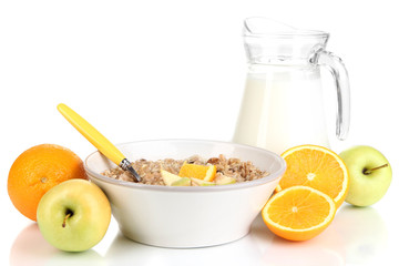 Useful oatmeal in bowl with fruit isolated on white