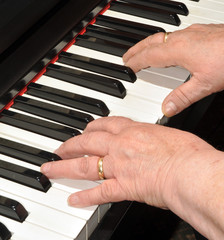 Hands Playing Piano