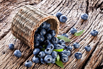 Fototapeta na wymiar Blueberries have dropped from the basket