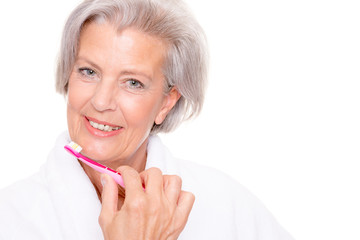 Senior woman with toothbrush