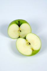 Green apple cut in half © Arena Photo UK