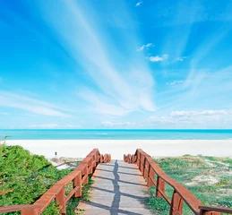 Acrylic prints La Pelosa Beach, Sardinia, Italy walk path and clouds