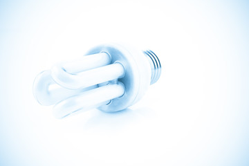 light bulb on a blue background color processed