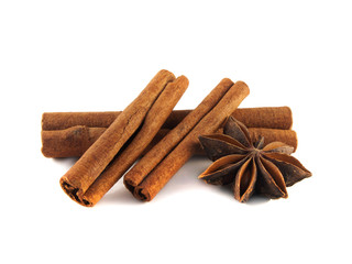 Cinnamon sticks and anise stars. Isolated.