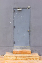 Exit door in concrete wall