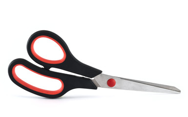 Metal scissors with a black handle, isolated