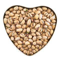 Heart shaped box full of pistachio