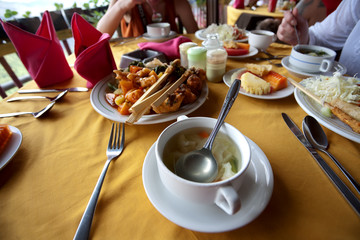 restaurant table with traditional balinese food
