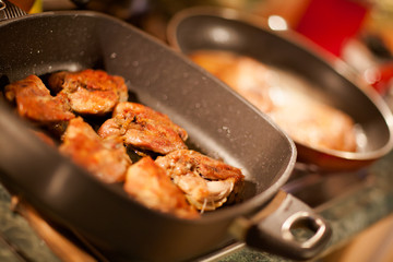 Frying hot chicken with smoke