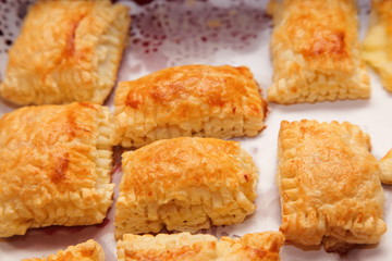 Puff cookies apple turnovers food background