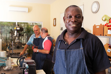 senior african metal worker in workshop