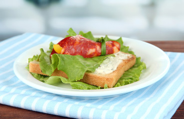 Salami rolls with paprika pieces inside,