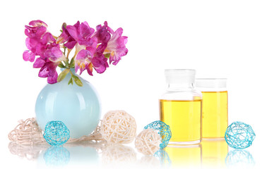 Spa oil and freesia isolated on white