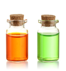 Bottles with basics oils isolated on white