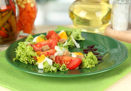 Fresh mixed salad with eggs, tomato, salad leaves and other