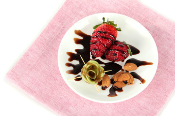 Fruit in chocolate on a napkin