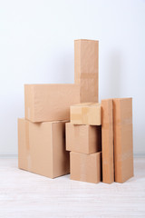 Different cardboard boxes in room