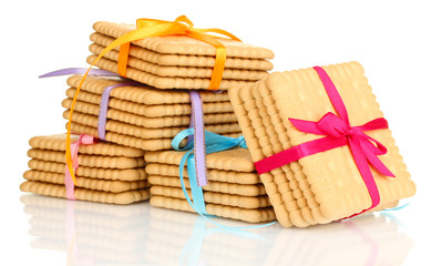 Sweet cookies tied with colorful ribbons isolated on white