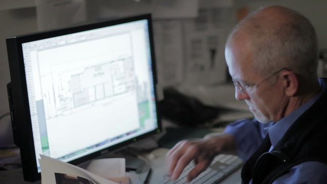 Architect working on his computer