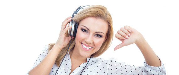 Naklejka premium Young woman with earphones