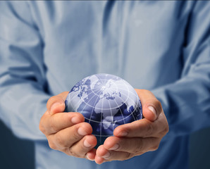 Globe ,earth in human hand